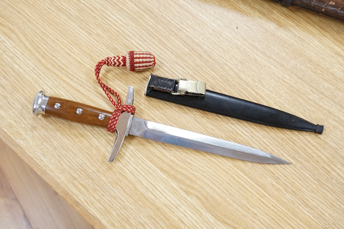 A post 1943 Swiss Army dagger, with knot and scabbard